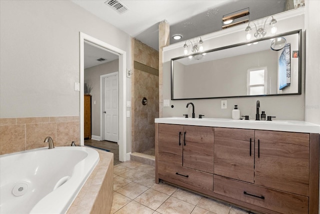736 Forest Glen Ct, Maitland, FL 32751 - bathroom featuring double vanity, a garden tub, tiled shower, and tile patterned floors