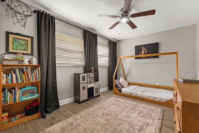 736 Forest Glen Ct, Maitland, FL 32751 - game room featuring a ceiling fan and wood finished floors