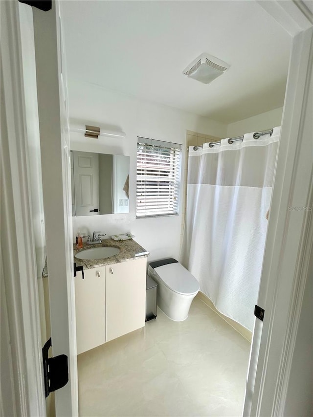 1084 Aspri Way, Riviera Beach, FL 33418 - full bathroom featuring vanity, toilet, and a shower with curtain