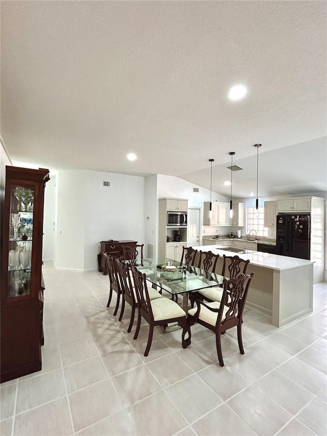 1084 Aspri Way, Riviera Beach, FL 33418 - dining space featuring a textured ceiling, recessed lighting, and light tile patterned flooring