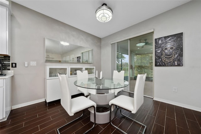 205 Lakeshore Dr, Davenport, FL 33837 - dining room featuring baseboards and wood finish floors