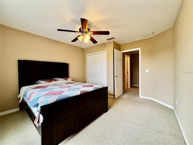 4368 Fox Glen Loop, Kissimmee, FL 34746 - bedroom featuring light carpet, baseboards, a closet, and ceiling fan