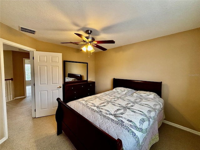 4368 Fox Glen Loop, Kissimmee, FL 34746 - bedroom featuring light colored carpet, baseboards, and ceiling fan