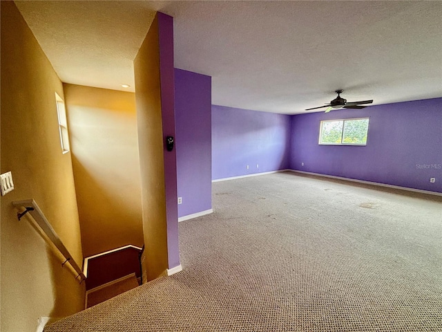 4368 Fox Glen Loop, Kissimmee, FL 34746 - carpeted spare room featuring ceiling fan, baseboards, and a textured ceiling