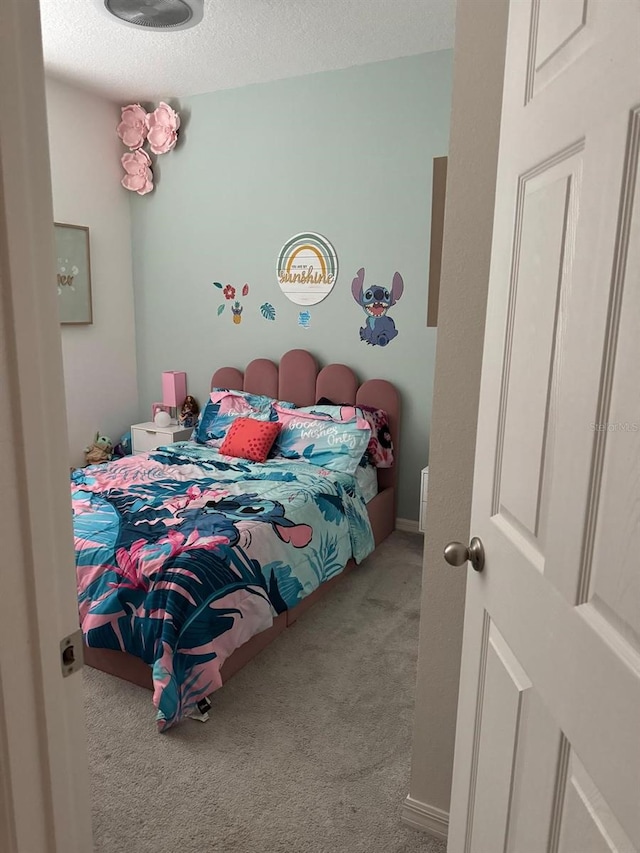 522 Feltrim Manor Rd, Haines City, FL 33844 - carpeted bedroom featuring a textured ceiling