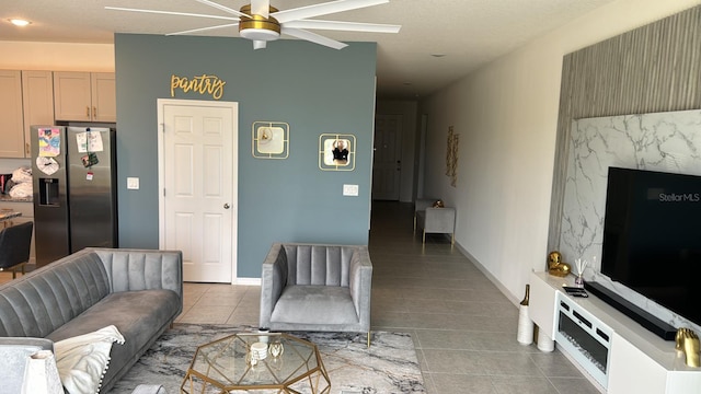 522 Feltrim Manor Rd, Haines City, FL 33844 - living room with light tile patterned floors, a ceiling fan, baseboards, and recessed lighting