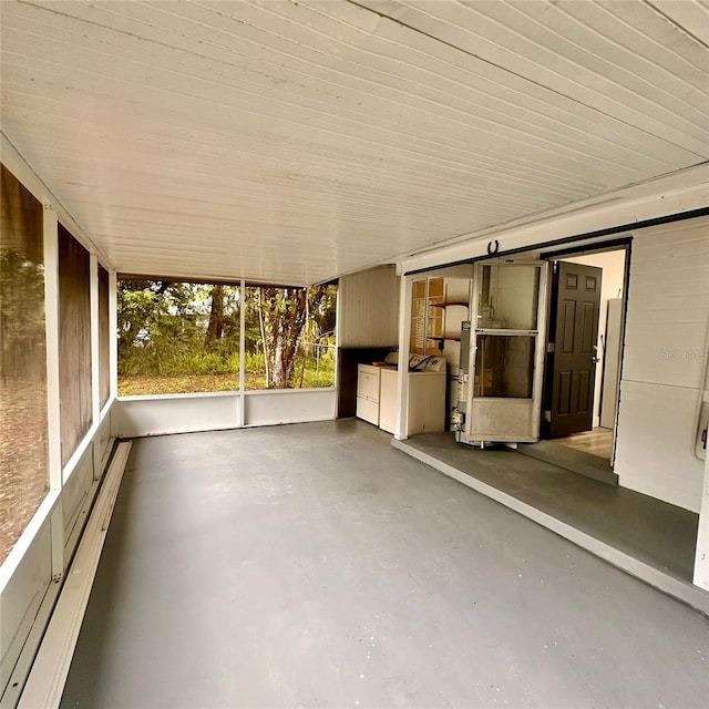 1615 NE 9th St, Ocala, FL 34470 - unfurnished sunroom with washer and clothes dryer