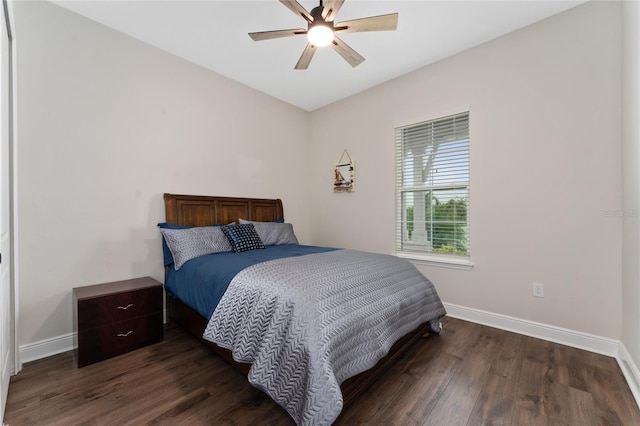 1598 Whitewood Ct, Kissimmee, FL 34747 - bedroom featuring baseboards, dark wood-type flooring, and ceiling fan