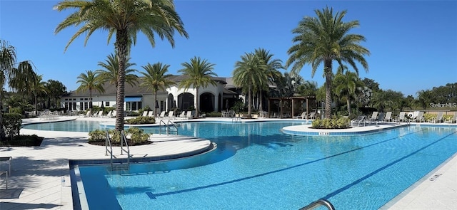 1598 Whitewood Ct, Kissimmee, FL 34747 - community pool with a patio