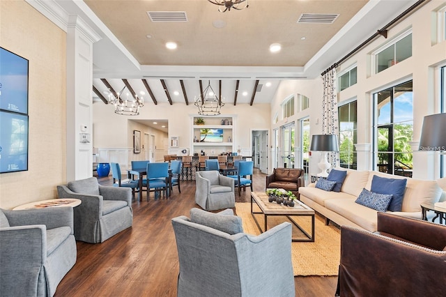 1598 Whitewood Ct, Kissimmee, FL 34747 - living room with dark wood-type flooring, a chandelier, a towering ceiling, and beamed ceiling