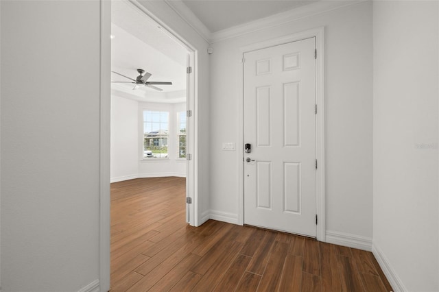 5648 Cedar Chase Dr, Saint Cloud, FL 34771 - entryway with dark wood-type flooring, ceiling fan, ornamental molding, and baseboards