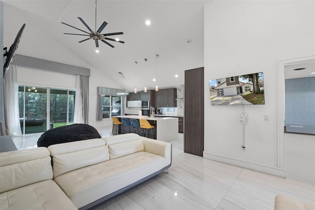 2561 Montego Bay Blvd, Kissimmee, FL 34746 - living area featuring high vaulted ceiling, ceiling fan, and recessed lighting