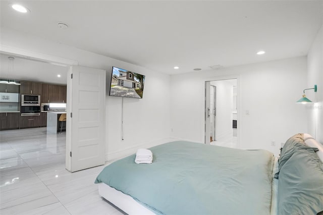 2561 Montego Bay Blvd, Kissimmee, FL 34746 - bedroom with recessed lighting and ensuite bathroom