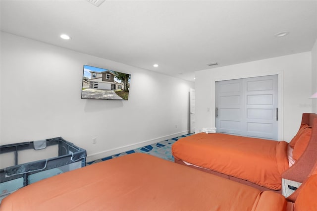 2561 Montego Bay Blvd, Kissimmee, FL 34746 - bedroom with recessed lighting, baseboards, and a closet
