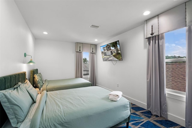 2561 Montego Bay Blvd, Kissimmee, FL 34746 - bedroom featuring multiple windows, recessed lighting, and baseboards