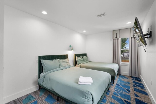2561 Montego Bay Blvd, Kissimmee, FL 34746 - bedroom with baseboards and recessed lighting
