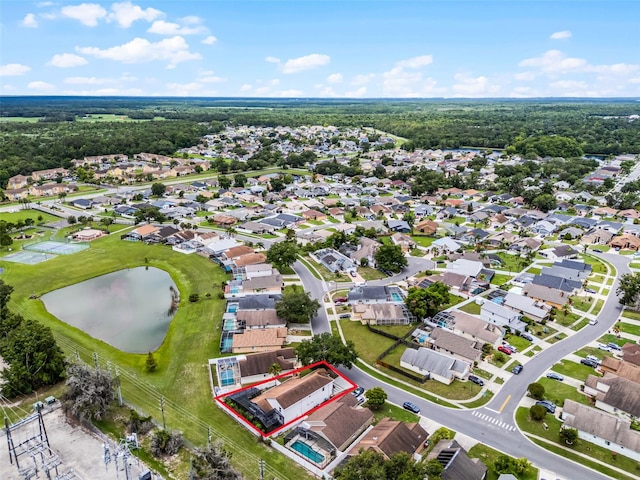 2561 Montego Bay Blvd, Kissimmee, FL 34746 - aerial perspective of suburban area with property parcel outlined and a large body of water