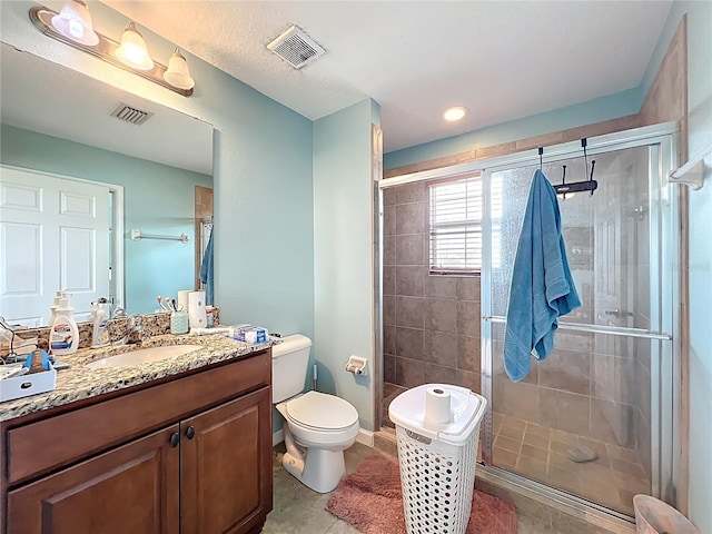 16072 Shasta St, Clermont, FL 34714 - bathroom featuring vanity, a shower stall, and toilet