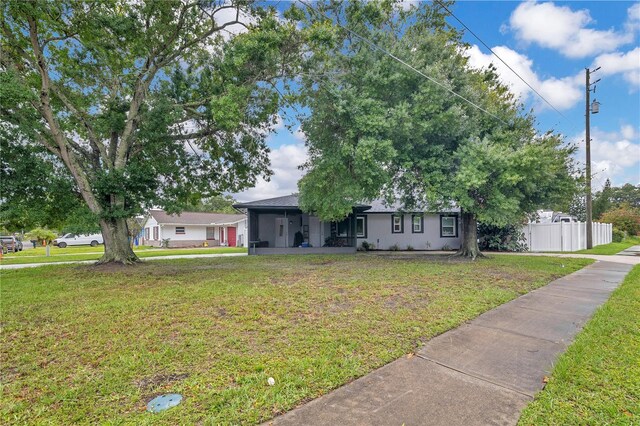 2 S Lavon Ave, Kissimmee, FL 34741 - ranch-style house with a sunroom
