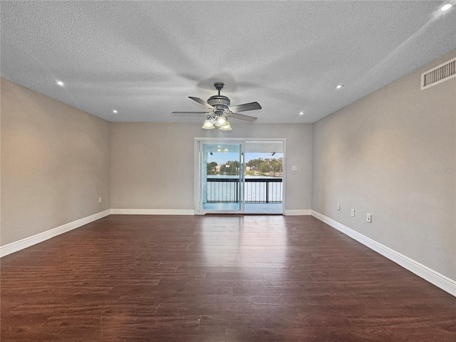 626 Orange Dr Unit 243, Altamonte Springs, FL 32701 - empty room featuring dark wood finished floors, ceiling fan, baseboards, a textured ceiling, and recessed lighting