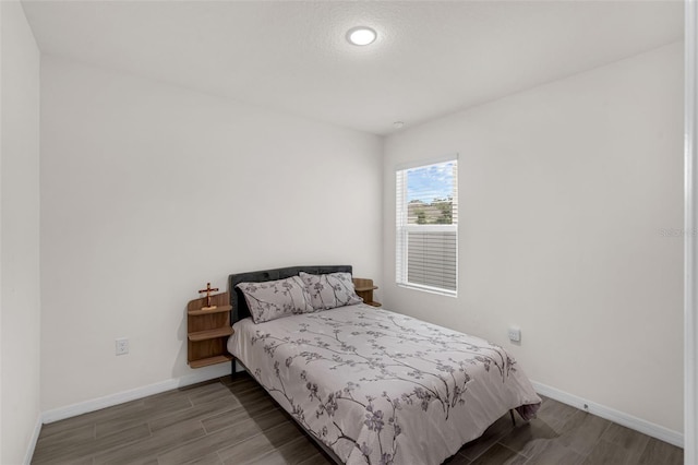 2838 Common Crane Ct, Harmony, FL 34773 - bedroom featuring wood finished floors, baseboards, and recessed lighting