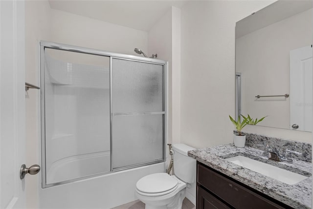 2838 Common Crane Ct, Harmony, FL 34773 - bathroom featuring vanity, toilet, and bath / shower combo with glass door