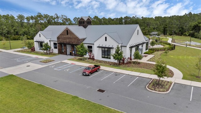 2838 Common Crane Ct, Harmony, FL 34773 - view of building exterior featuring uncovered parking