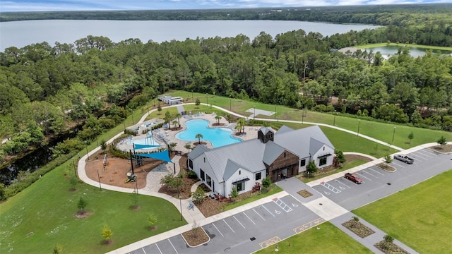 2838 Common Crane Ct, Harmony, FL 34773 - bird's eye view of a large body of water, a pool, and a forest