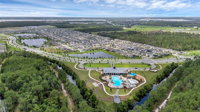2838 Common Crane Ct, Harmony, FL 34773 - aerial overview of property's location with a pool area, a nearby body of water, and nearby suburban area