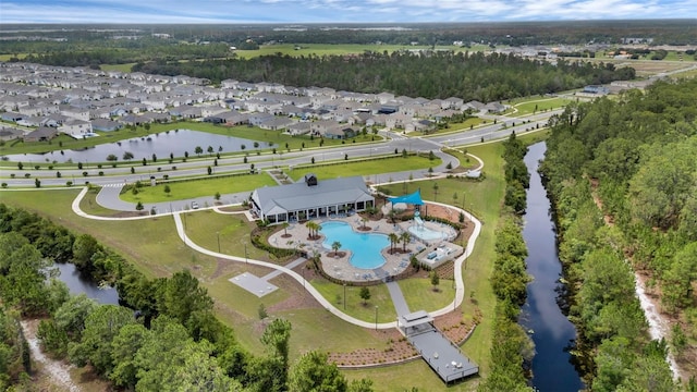 2838 Common Crane Ct, Harmony, FL 34773 - aerial view of property's location with a pool area, a nearby body of water, and nearby suburban area