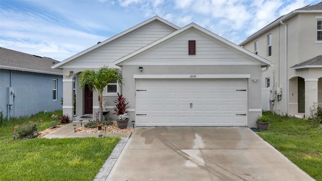 2838 Common Crane Ct, Harmony, FL 34773 - single story home with driveway, a garage, a front yard, and stucco siding