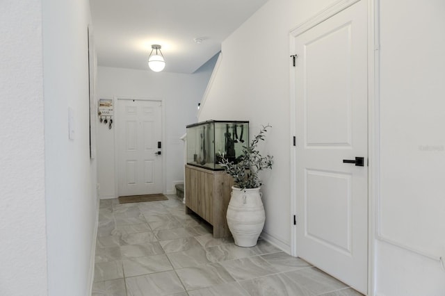 466 Cool Summer Ln, Davenport, FL 33837 - foyer entrance with light marble finish floors and baseboards