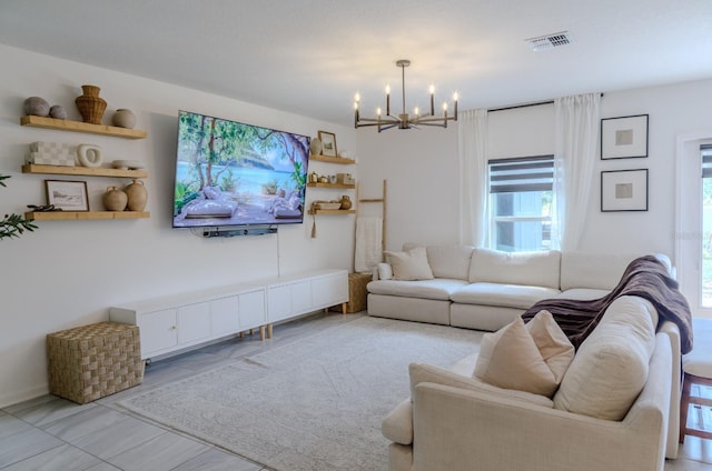 466 Cool Summer Ln, Davenport, FL 33837 - living room with a chandelier