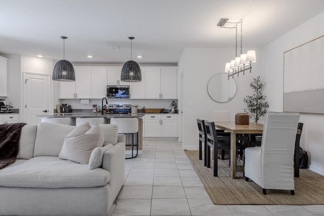 466 Cool Summer Ln, Davenport, FL 33837 - living room featuring recessed lighting