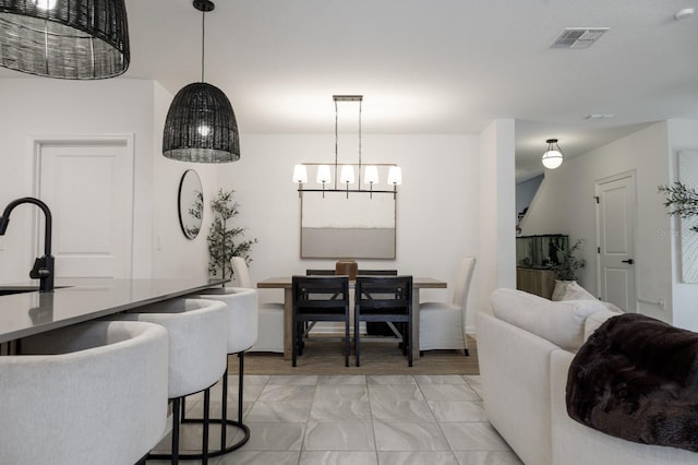 466 Cool Summer Ln, Davenport, FL 33837 - dining space featuring light marble finish floors