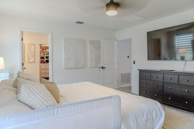 466 Cool Summer Ln, Davenport, FL 33837 - bedroom featuring light colored carpet, a spacious closet, and a ceiling fan