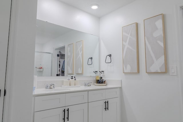 466 Cool Summer Ln, Davenport, FL 33837 - full bath with double vanity, a shower with door, and a walk in closet
