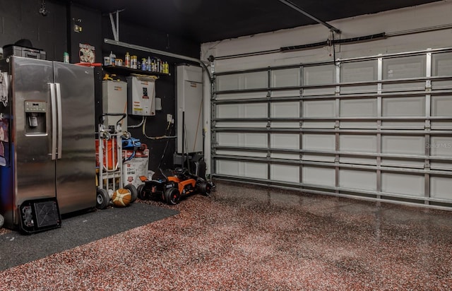 466 Cool Summer Ln, Davenport, FL 33837 - garage featuring stainless steel fridge