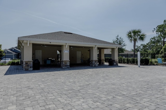 466 Cool Summer Ln, Davenport, FL 33837 - rear view of property with stucco siding