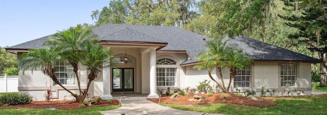 5254 Mill Stream Dr, Saint Cloud, FL 34771 - view of front facade featuring stucco siding and roof with shingles