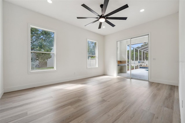 5254 Mill Stream Dr, Saint Cloud, FL 34771 - unfurnished room with healthy amount of natural light, light wood-type flooring, baseboards, and recessed lighting