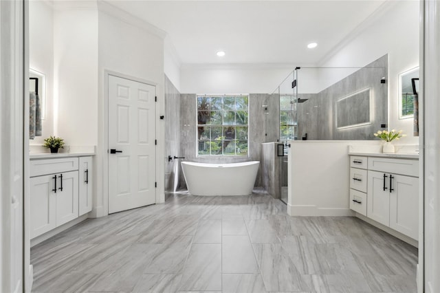 5254 Mill Stream Dr, Saint Cloud, FL 34771 - full bath featuring a stall shower, vanity, crown molding, a soaking tub, and marble finish flooring