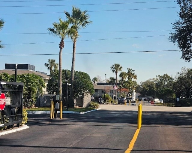 1920 Conway Rd Unit 4, Orlando, FL 32812 - view of asphalt road with traffic signs and curbs
