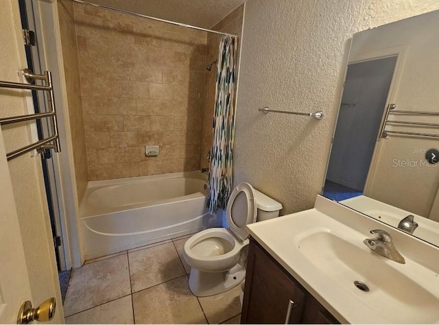 1920 Conway Rd Unit 4, Orlando, FL 32812 - full bathroom featuring a textured wall, tile patterned floors, toilet, shower / tub combo, and vanity