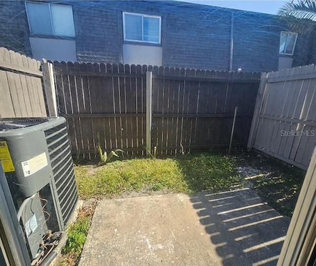 1920 Conway Rd Unit 4, Orlando, FL 32812 - fenced backyard with central AC unit and a patio