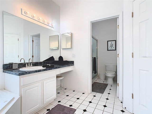 116 Westport Ln, Davenport, FL 33896 - bathroom with toilet, a stall shower, vanity, a bath, and baseboards