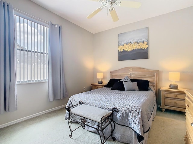 116 Westport Ln, Davenport, FL 33896 - bedroom featuring carpet floors, baseboards, and a ceiling fan
