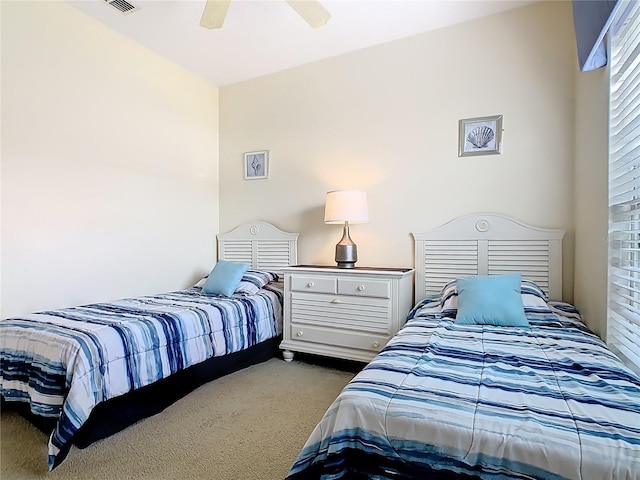 116 Westport Ln, Davenport, FL 33896 - bedroom featuring carpet floors and ceiling fan