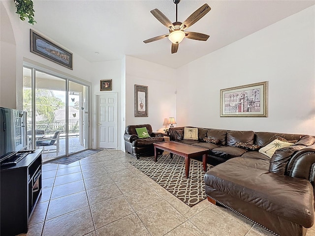107 Amaca Ln, Davenport, FL 33897 - living room with ceiling fan, arched walkways, and light tile patterned floors