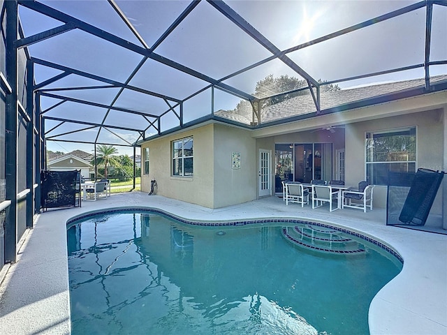 107 Amaca Ln, Davenport, FL 33897 - outdoor pool featuring a patio, ceiling fan, and a lanai